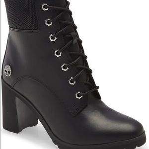 Black Timberland lace up heeled boots